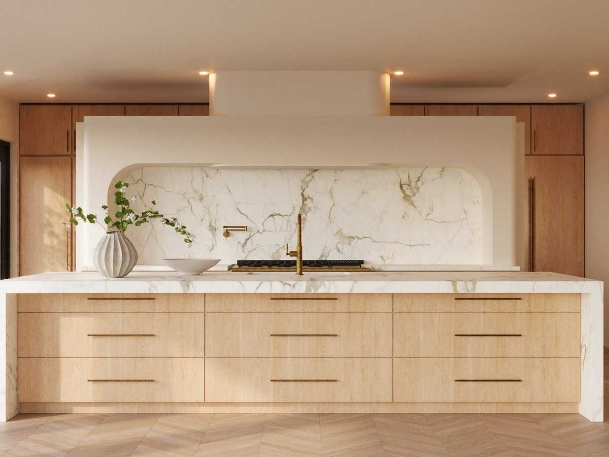 Rendering: a veined stone wall in a rounded plaster surround, behind a long oak island